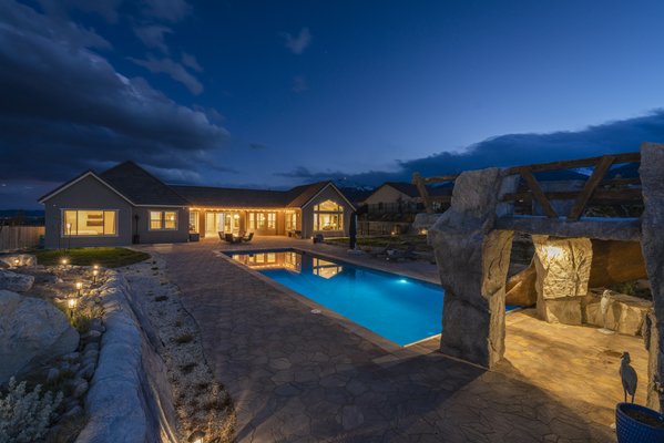 5427 Salmon River Court - Luxury living in South Reno! Set on a private lot with nearly 2 acres and panoramic mountain, valley and city views, this beautifully upgraded single-level home is designed for entertaining! The 55 foot lap pool is the centerpiece of the impressive backyard and features a huge waterfall, grotto with surround sound, custom hollow log slide, motorized cover and commercial-grade heating system. Excellent location in a cul-de-sac and zoned for desirable schools, with easy access to recreation at Lake Tahoe. 5427 Salmon River Court - Luxury living in South Reno! Set on a private lot with nearly 2 acres and panoramic mountain, valley and city views, this beautifully upgraded single-level home is designed for entertaining! The 55 foot lap pool is the centerpiece of the impressive backyard and features a huge waterfall, grotto with surround sound, custom hollow log slide, motorized cover and commercial-grade heating system. Excellent location in a cul-de-sac and zoned for desirable schools, with easy access to recreation at Lake Tahoe.