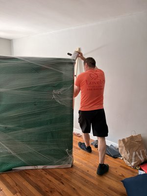 97°F outside, four flights of stairs, and another successful move completed. - Hot weather doesn't change how we move. It just means we drink more water and take extra care.

A lot of people think stair moves have to be stressful, but when they're done the right way, they're not.

Before anything leaves the apartment, every piece of furniture is wrapped with moving blankets and stretch wrap to protect it from scratches, dents, and dirt. On the stairs, there are no shortcuts. We move one step at a time, communicate with each other, and make sure every item is carried safely from start to finish.

Whether it's a fifth-floor walk-up, a narrow staircase, or a heavy dresser that barely fits around the corner, experience makes the difference. Moving isn't about carrying things as fast as possible-it's about protecting what's important to our customers.

From walk-up apartments in NYC to long-distance relocations across the country, stairs have never been a problem for us. We provide local moves within 200 miles and long-distance moving services up to 1,000 miles. Whether you're moving a studio apartment, a family home, or an office, we bring the same level of care, preparation, and attention to every move.