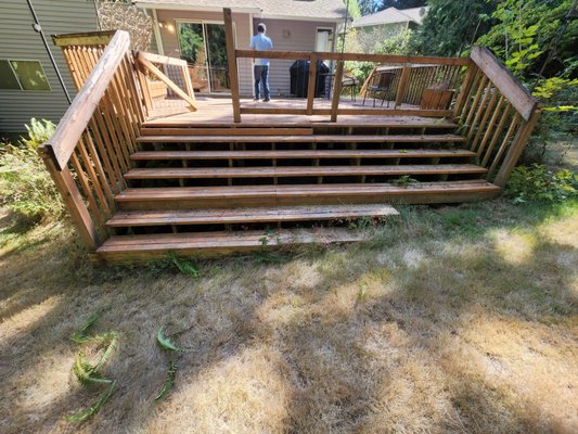Large Deck Remodel | Redmond, WA - This large deck was old, unsafe and just a sore to the eyes. The structural frame and footings were solid for the most part and the customer wanted to save as much of it as possible. With some structural repairs and a complete tear down of the decking and railings we were able to bring this old deck back to life using Trex Composite decking and railings that will last a lifetime. Large Deck Remodel | Redmond, WA - This large deck was old, unsafe and just a sore to the eyes. The structural frame and footings were solid for the most part and the customer wanted to save as much of it as possible. With some structural repairs and a complete tear down of the decking and railings we were able to bring this old deck back to life using Trex Composite decking and railings that will last a lifetime.