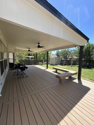 Patio Cover and Composite Deck - We recently completed this beautiful 16′ × 40′ composite deck using TimberTech® boards in Coconut Husk—a soft, natural tone that brings warmth and character to the outdoor space. The deck was designed for comfort and functionality, with a clean, modern layout and hidden fasteners for a seamless finish.
Connected to the deck is a 16′ × 29′ custom patio cover, built from pressure-treated wood and finished with matching house shingles and paint to blend perfectly with the existing architecture. The covered area includes two ceiling fans for airflow and comfort, making it an ideal space for relaxing or entertaining throughout the seasons.
As part of this project, we also handled the entire HOA approval process, including all necessary designs, permits, and paperwork, making the experience smooth and stress-free for the homeowners.
This project showcases how a thoughtful blend of materials, smart design, and attention to detail can create a beautiful, durable outdoor living space that feels like a true extension of the home. Patio Cover and Composite Deck - We recently completed this beautiful 16′ × 40′ composite deck using TimberTech® boards in Coconut Husk—a soft, natural tone that brings warmth and character to the outdoor space. The deck was designed for comfort and functionality, with a clean, modern layout and hidden fasteners for a seamless finish.
Connected to the deck is a 16′ × 29′ custom patio cover, built from pressure-treated wood and finished with matching house shingles and paint to blend perfectly with the existing architecture. The covered area includes two ceiling fans for airflow and comfort, making it an ideal space for relaxing or entertaining throughout the seasons.
As part of this project, we also handled the entire HOA approval process, including all necessary designs, permits, and paperwork, making the experience smooth and stress-free for the homeowners.
This project showcases how a thoughtful blend of materials, smart design, and attention to detail can create a beautiful, durable outdoor living space that feels like a true extension of the home.