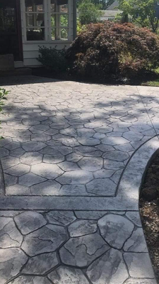 Stone Concrete Patio - Stunning random stone concrete patio! This is a light gray base with dark gray accents
