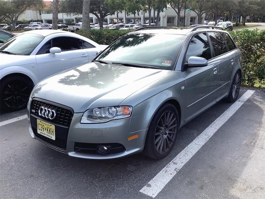 Audi Service and Repair - This 2008 Audi A4 Wagon came to us with a few issues. IT was running poorly, smoking, and leaking coolant. We repaired the running problem, resealed the leaking valve cover gaskets, replaced the leaking thermostat, and replaced a torn CV boot. The car left with all issues repaired and vehicle washed and vacuumed. The customer got a loaner car to drive while repairs were being conducted.