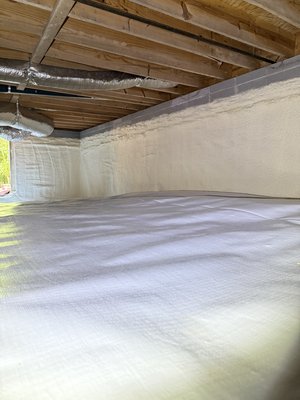 Crawlspace Encapsulation & Spray Foam Foundation Wall Insulation | Greenville, SC - We transformed this damp, poorly insulated crawlspace into a clean, energy-efficient, and moisture-controlled space.

Our team removed the old damaged insulation before installing a premium reinforced crawlspace encapsulation system with full ground coverage. We also applied closed-cell spray foam insulation to the foundation walls to improve energy efficiency, reduce humidity, and create a healthier environment beneath the home.