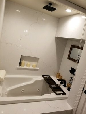 Shower Remodel Tacoma 2023 - We converted a shower into a bathtub. Job was framing, plumbing, installing backer board, granite and some finishing.