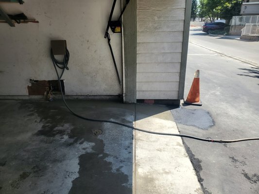 water main leaking - brake driveway to repair water leak and patch