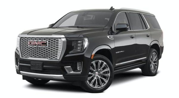 GMC Yukon XL - One of the many spacious vehicles we offer. Max capacity 6-7 Persons.
