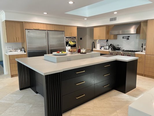 Kitchen Remodel - Temecula - This beauty came to life after transforming an old and closed kitchen to an open floor concept including vaulted ceilings, custom oak cabinets, quartz countertops, a custom island & a breakfast bar. Kitchen Remodel - Temecula - This beauty came to life after transforming an old and closed kitchen to an open floor concept including vaulted ceilings, custom oak cabinets, quartz countertops, a custom island & a breakfast bar.