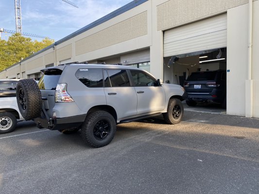 Lexus GX 460 Color Change Full Wrap - This off road rig was completely revamped with a chrome delete and full Matte Dark Grey wrap by Avery. Lexus GX 460 Color Change Full Wrap - This off road rig was completely revamped with a chrome delete and full Matte Dark Grey wrap by Avery.