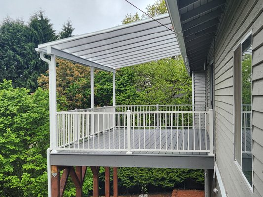 Rebuilt with Cover - The deck was rebuilt and, added a cover to enjoy the deck all year round.