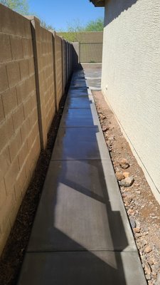 walkway with concrete pad - This was a new walkway on the side of a house with a concrete pad at the end.