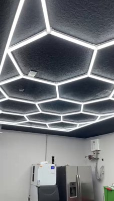 Garage lighting. - 💡🚗 Brighten up your garage like never before! Just completed an awesome transformation in West Palm Beach – upgraded old lights to sleek, energy-efficient LEDs arranged in a stylish hexagonal pattern. ✨🔲

Here’s what we did: 
🔧 Removed outdated lighting fixtures 
💡 Installed modern LED lights for brighter, more efficient illumination
 🔲 Arranged them in a unique hexagonal design for a fresh, contemporary look

Ready to upgrade your garage lighting? Let us help you turn your space into a bright and inviting area. Contact us for custom lighting solutions and let's make your garage shine! 💪✨

#WestPalmBeach #GarageLighting #LEDUpgrade #HexagonalDesign #Electrician #HomeImprovement #LightingSolutions