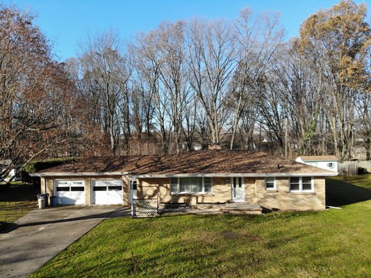 Saint Joseph Michigan Roof, Gutter and Gutter Protection Project - Products Installed: CertainTeed Lifetime Warranty LandMarkPro Shingles in Resawn Shake, White Seamless Gutters and Tan Lifetime Warranty Gutter Topper