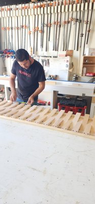 Behind the scenes of some of our Summer Projects 2025 in the workshop. - We work on a variety of projects making custom.  This month we are making a custom loft bed and bookcases  for one of our Repeat customers the Finks. This is their third project. We have designer bath vanity and linen for interior designer Genevieve Rouleau with custom drawers and doors with fluted and reeded fronts.  Lastly, we have we Wu desk office with a curved front desktop.