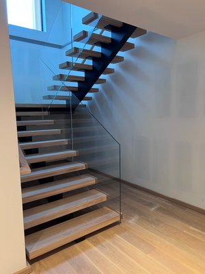 Scuttlehole back stair - We manufactured and powder coated this single stringer staircase for Elegant Stairs and rails near the end of Long Island, NY. They installed the structure and added the wood treads and glass rails. Scuttlehole back stair - We manufactured and powder coated this single stringer staircase for Elegant Stairs and rails near the end of Long Island, NY. They installed the structure and added the wood treads and glass rails.