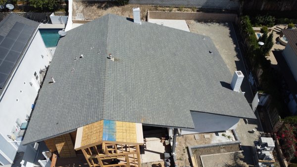 Presidential Shingle Roof Upgrade - The homeowner’s existing shingles were worn and outdated, and they wanted a more luxurious, upgraded look to match the rest of the renovation. We removed the old shingles and installed CertainTeed Presidential Solaris shingles, delivering a premium, dimensional finish with improved reflectivity and enhanced curb appeal