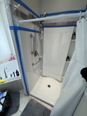 Shower Enclosure Remodel - We completed a fast, clean fiberglass shower enclosure installation for a client who unfortunately has fallen ill and needed improved comfort and safety. The new unit provided an extra 4 inches of interior space to make movement easier, and we installed secure grab bars for added stability and confidence. The old enclosure was removed, the new system set and sealed efficiently, and everything was finished with minimal disruption—because when health is involved, speed, precision, and care matter most.