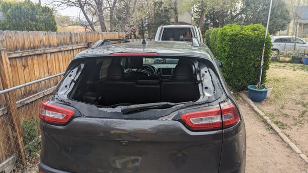 Jeep Cherokee Broken Back Glass Replacement - this was a Jeep Grand Cherokee back glass replacement due to vandalism here in Albuquerque. this is the second back glass replacement I've done for this gentleman due to vandalism.