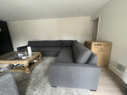 Modern Sectional - We reupholstered this sectional to better fit our client's minimalist, modern decor. Modern Sectional - We reupholstered this sectional to better fit our client's minimalist, modern decor.