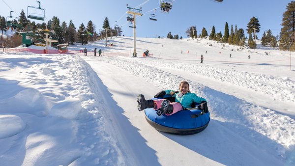 Winter Snow Tubing - Skip the hiking and take a magic carpet to the top of the tube park, then slide down our four (4) 300-foot tubing lanes as fast as you can in one of our high-speed tubes. Winter Snow Tubing - Skip the hiking and take a magic carpet to the top of the tube park, then slide down our four (4) 300-foot tubing lanes as fast as you can in one of our high-speed tubes.