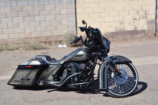 2018 Harley Davidson street glide special - This is 2018 Harley Davidson street glide special. This got a full custom set of bags, rear fender, stretched tank, stretched front fender, custom side covers and tank dash. With a full custom paint job that we did in metal flake and black candy. This bike has won multiple awards at the lowrider super show with best in show being one of those awards.