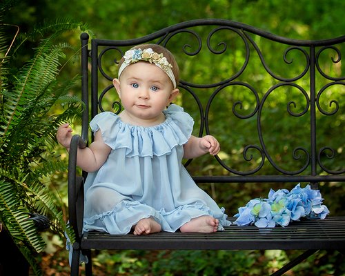 Baby's First Year - "Children grow and change right before your eyes. Time flies, and we're here to help you document your family's beautiful journey throughout the years. From the first smile to every precious milestone, we'll capture the wonderful transformation of your baby as they grow into someone new.

Our designer sessions are crafted to lavish your little one from head to toe with exquisite accessories and specially selected props, all complimentary and customizable with personal treasures. Whether it's their first month or first birthday, we offer sessions to celebrate every special moment during their first year."