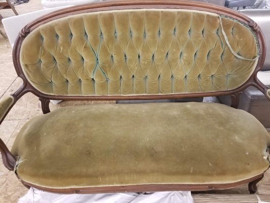Furniture restoration - In this piece, we have to replace the old upholstering materials and put new one.