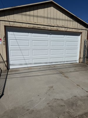 NEW GARAGE DOOR (MUCH NEEDED UPGRADE) - This customer was looking for a stylish upgrade without breaking the bank. Their old wood door was falling apart and long overdue for replacement. We installed a cost-effective yet modern garage door that made a huge difference in the home’s curb appeal. The transformation was dramatic, and the client was thrilled with how much better the home looked—without going over budget. NEW GARAGE DOOR (MUCH NEEDED UPGRADE) - This customer was looking for a stylish upgrade without breaking the bank. Their old wood door was falling apart and long overdue for replacement. We installed a cost-effective yet modern garage door that made a huge difference in the home’s curb appeal. The transformation was dramatic, and the client was thrilled with how much better the home looked—without going over budget.