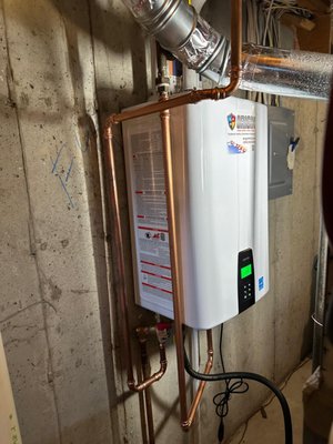 Installing New Tankless Water Heater - We installed a new tankless water heater in a townhouse in Northern Colorado. Installing New Tankless Water Heater - We installed a new tankless water heater in a townhouse in Northern Colorado.