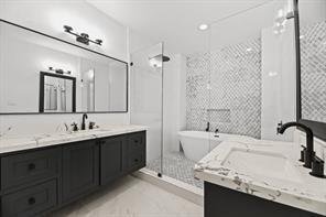 Bathroom Remodels - Waller TX - This bathroom remodel project transformed both the primary and secondary bathrooms into elegant, modern spaces with a balance of bold contrast and timeless style. Each bathroom was designed with functionality, comfort, and aesthetic appeal in mind, using high-quality materials and a thoughtful layout to maximize space.
The primary bathroom is a true retreat, featuring a glass-enclosed wet area that combines a freestanding soaking tub and a rainfall shower. The striking mosaic tile wall adds texture and a luxurious feel, while black fixtures provide a sleek, modern contrast. A double vanity with deep charcoal cabinetry and quartz countertops ensures ample storage and counter space. The oversized mirror and contemporary lighting complete the look, making the space feel bright and open.
The secondary bathroom maintains a clean and sophisticated aesthetic with a classic black-and-white color scheme. A built-in bathtub with a tiled shower surround creates a simple yet stylish space, with a black shower niche for added functionality. The floating vanity with black cabinetry pairs beautifully with the matte black fixtures and framed mirror, adding a bold, contemporary touch. Open shelving near the tub offers convenient storage while keeping the space uncluttered.
Both bathrooms feature high-end finishes, durable materials, and a modern yet timeless look that will stand the test of time. These remodels reflect a perfect blend of style and practicality, creating inviting spaces that are as beautiful as they are functional. Bathroom Remodels - Waller TX - This bathroom remodel project transformed both the primary and secondary bathrooms into elegant, modern spaces with a balance of bold contrast and timeless style. Each bathroom was designed with functionality, comfort, and aesthetic appeal in mind, using high-quality materials and a thoughtful layout to maximize space.
The primary bathroom is a true retreat, featuring a glass-enclosed wet area that combines a freestanding soaking tub and a rainfall shower. The striking mosaic tile wall adds texture and a luxurious feel, while black fixtures provide a sleek, modern contrast. A double vanity with deep charcoal cabinetry and quartz countertops ensures ample storage and counter space. The oversized mirror and contemporary lighting complete the look, making the space feel bright and open.
The secondary bathroom maintains a clean and sophisticated aesthetic with a classic black-and-white color scheme. A built-in bathtub with a tiled shower surround creates a simple yet stylish space, with a black shower niche for added functionality. The floating vanity with black cabinetry pairs beautifully with the matte black fixtures and framed mirror, adding a bold, contemporary touch. Open shelving near the tub offers convenient storage while keeping the space uncluttered.
Both bathrooms feature high-end finishes, durable materials, and a modern yet timeless look that will stand the test of time. These remodels reflect a perfect blend of style and practicality, creating inviting spaces that are as beautiful as they are functional.