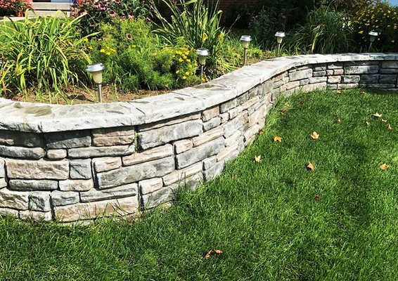 Retaining Wall - Retaining Wall
Turn a tricky, unusable, or unsightly area of your yard into a beautiful, cohesive feature. Our retaining wall blocks feature an innovative locking lip, so your retaining wall can curve to the outside or inside.
You can choose from a variety of color, texture and size options. Colors are integral throughout the units. This ensures that the color will show consistently throughout a special feature, such as a stair or column. Retaining Wall - Retaining Wall
Turn a tricky, unusable, or unsightly area of your yard into a beautiful, cohesive feature. Our retaining wall blocks feature an innovative locking lip, so your retaining wall can curve to the outside or inside.
You can choose from a variety of color, texture and size options. Colors are integral throughout the units. This ensures that the color will show consistently throughout a special feature, such as a stair or column.