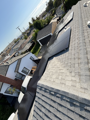 Solar Panel Installation, North Hollywood, CA - This home had a perfect, unobstructed roof plane, and our team made sure not to waste an inch of it. By designing an edge-to-edge 15-panel array, we turned this roof into a massive energy generator. Our team believes that what happens under the panels is just as important as the panels themselves. We utilized a low-profile racking system that keeps the panels close to the shingles for better wind resistance and a superior aesthetic profile. Solar Panel Installation, North Hollywood, CA - This home had a perfect, unobstructed roof plane, and our team made sure not to waste an inch of it. By designing an edge-to-edge 15-panel array, we turned this roof into a massive energy generator. Our team believes that what happens under the panels is just as important as the panels themselves. We utilized a low-profile racking system that keeps the panels close to the shingles for better wind resistance and a superior aesthetic profile.