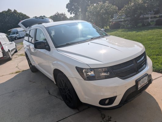 2017 Dodge Journey - This 2017 Dodge Journey received a full interior and exterior detail, including deep carpet cleaning, pet hair and debris removal, cleaning underneath the seats, detailed interior surfaces, hand washing, and headlight restoration. The vehicle was thoroughly cleaned and refreshed from top to bottom.