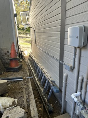Shed lighting and receptacles - This customer wanted power and lighting in their shed. We were able to do so by connecting the shed power to an existing exterior 20 amp circuit and running half inch flexible liquid tight on the exterior of the home and jumping over to the shed into an exterior box with a GFCI. The GFCI offers protection and is more sensitive than the panel breaker. 12/2 THHN was used in the liquid tight and 12/2 AC WAS USED IN THE SHED. Shed lighting and receptacles - This customer wanted power and lighting in their shed. We were able to do so by connecting the shed power to an existing exterior 20 amp circuit and running half inch flexible liquid tight on the exterior of the home and jumping over to the shed into an exterior box with a GFCI. The GFCI offers protection and is more sensitive than the panel breaker. 12/2 THHN was used in the liquid tight and 12/2 AC WAS USED IN THE SHED.