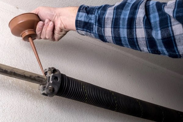 Garage Door Spring Repair - Recognize the following indicators that your garage door springs require professional attention:
Uneven Opening or Closing: One side lifting faster than the other.
Loud Noise: Sudden loud bangs or popping sounds when operating the door.
Visible Wear or Gaps: Noticeable stretching, separation, or visible damage.
Door Won’t Fully Open or Close: Difficulty operating the door completely indicates weakened springs.
Door Falling Quickly: A garage door rapidly descending is a serious safety hazard indicating spring issues. Garage Door Spring Repair - Recognize the following indicators that your garage door springs require professional attention:
Uneven Opening or Closing: One side lifting faster than the other.
Loud Noise: Sudden loud bangs or popping sounds when operating the door.
Visible Wear or Gaps: Noticeable stretching, separation, or visible damage.
Door Won’t Fully Open or Close: Difficulty operating the door completely indicates weakened springs.
Door Falling Quickly: A garage door rapidly descending is a serious safety hazard indicating spring issues.