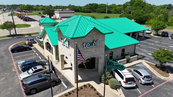 24 Guage Custom (Principal Green) Snap-Lock Roof, Belton, TX - Custom colors?!  The first of a few, Texell wanted this "Principal Green" and we made it happen! Not only did we make the custom color possible, but we also worked with Texell's business hours and seamlessly completed this installation without interrupting their day-to-day workflow. The curb appeal this color creates is unbelievable and cannot be missed!