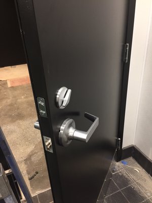 Commercial lock installation - This lock and lever has been installed on a commercial door in a restaurant.