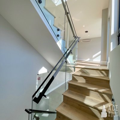 Stair Glass Railing - We installed a frameless glass stair railing at this project.
We used stand-offs to install all the glass.
Hardware finish was Matte Black.