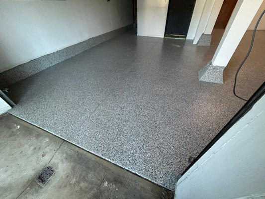 Garage Floor Coating using Domino Flake Chip - Elevate your garage flooring with our superior polyurea coatings for unmatched durability and aesthetics. This high-performance coating system outshines any other epoxy garage floors and DIY kits. Our robust, filler-free formula ensures superior longevity and resilience – guaranteed by a lifetime warranty! Garage Floor Coating using Domino Flake Chip - Elevate your garage flooring with our superior polyurea coatings for unmatched durability and aesthetics. This high-performance coating system outshines any other epoxy garage floors and DIY kits. Our robust, filler-free formula ensures superior longevity and resilience – guaranteed by a lifetime warranty!