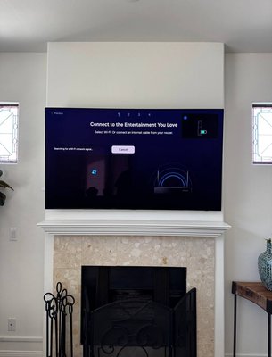 TV installation above fireplace with wire concealment. - Mounted the TV securely above the fireplace with precise centering and proper height for comfortable viewing. All cables were professionally concealed inside the wall for a clean, modern look with no visible wires. Safe installation on a challenging surface with attention to detail and long-term reliability. TV installation above fireplace with wire concealment. - Mounted the TV securely above the fireplace with precise centering and proper height for comfortable viewing. All cables were professionally concealed inside the wall for a clean, modern look with no visible wires. Safe installation on a challenging surface with attention to detail and long-term reliability.