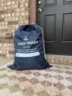 Grab a Laundry Bag - Whether you use our bag or a 13-gallon bag, you can rest assured that your laundry will be treated with the highest quality care and cleanliness. The best part is that you won't have to spend your time doing the laundry! Visit ameriwashlaundry.com to customize your order and schedule your pickup! Grab a Laundry Bag - Whether you use our bag or a 13-gallon bag, you can rest assured that your laundry will be treated with the highest quality care and cleanliness. The best part is that you won't have to spend your time doing the laundry! Visit ameriwashlaundry.com to customize your order and schedule your pickup!