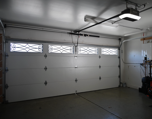 Garage Door Sensor Repairs - Opener light flashing? We troubleshoot misaligned safety eyes, damaged wiring, and sun interference. We adjust the beam to ensure your door closes smoothly and reverses only when obstructed. Schedule your safety check now!