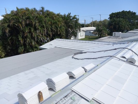 Boral Tile Install. Saxony 900 - Remove existing Tile roof to wood deck. Clean up surface to a workable condition.
Replace any rotted wood (See price list below)
Re-nailing wood deck as per FBC with 2 ½ ring shank nails.
Install one-layer of #30 ASTM D-226 Type II dry in felt tin capped with 1 ¼ ring shank nails.
Replace lead stacks, metal roof vents, valley metals, and 3x3 drip edge metals painted.
Install one layer of Boral seal underlayment Tile underlayment over dry in felt. (Back nailed)
Install new Boral concrete tile profile Villa 900 attached with (ICP Polyset AH-160) Poly foam and mortar.
Tile color by customer or association. _____________________ Boral Tile Install. Saxony 900 - Remove existing Tile roof to wood deck. Clean up surface to a workable condition.
Replace any rotted wood (See price list below)
Re-nailing wood deck as per FBC with 2 ½ ring shank nails.
Install one-layer of #30 ASTM D-226 Type II dry in felt tin capped with 1 ¼ ring shank nails.
Replace lead stacks, metal roof vents, valley metals, and 3x3 drip edge metals painted.
Install one layer of Boral seal underlayment Tile underlayment over dry in felt. (Back nailed)
Install new Boral concrete tile profile Villa 900 attached with (ICP Polyset AH-160) Poly foam and mortar.
Tile color by customer or association. _____________________