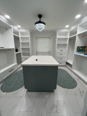 Bathroom & Closet Remodel - For this project, our client wanted to maximize their space by transforming two small closets into a more functional and stylish bathroom. We removed the existing vanity, shower, and tub, then relocated the vanity and shower into the former closet spaces—creating a spacious walk-in shower and a double vanity with a tower in the center for additional storage.
Where the old vanity and shower/tub once stood, we built a custom closet system with built-in cabinetry, optimizing organization and usability. The renovation was completed with all-new flooring and fresh wall paint, giving the space a modern and cohesive look.
This transformation not only enhanced functionality but also brought a fresh and elegant design to the home! Bathroom & Closet Remodel - For this project, our client wanted to maximize their space by transforming two small closets into a more functional and stylish bathroom. We removed the existing vanity, shower, and tub, then relocated the vanity and shower into the former closet spaces—creating a spacious walk-in shower and a double vanity with a tower in the center for additional storage.
Where the old vanity and shower/tub once stood, we built a custom closet system with built-in cabinetry, optimizing organization and usability. The renovation was completed with all-new flooring and fresh wall paint, giving the space a modern and cohesive look.
This transformation not only enhanced functionality but also brought a fresh and elegant design to the home!
