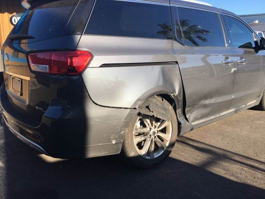 Kia Sedona SXL rear quarter panel damage - This Kia Sedona SXL was hit in the right rear quarter panel and sliding door area. We repaired/replaced the rear quarter and many other parts. The customer was thrilled to have her van back! Kia Sedona SXL rear quarter panel damage - This Kia Sedona SXL was hit in the right rear quarter panel and sliding door area. We repaired/replaced the rear quarter and many other parts. The customer was thrilled to have her van back!