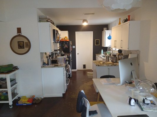 Kitchen Remodel with Custom Cabinetry - This kitchen remodel was completed on an old kitchen that needed updating and refiguring to suit the needs of the homeowner who loves to cook.