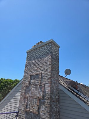 Chimney Rebuild in Monroe, NJ - We rebuilt the top of this chimney in Monroe, NJ. This job required scaffolding on the roof to complete the project. Chimney Rebuild in Monroe, NJ - We rebuilt the top of this chimney in Monroe, NJ. This job required scaffolding on the roof to complete the project.