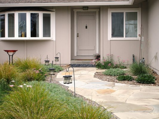 Welcoming Entrance Meadow and Path - The garden space was dead when we arrived. We installed a flagstone path that connected to the driveway and street, and a dense, abundant arrangement of hummingbird-friendly drought tolerant plants. Welcoming Entrance Meadow and Path - The garden space was dead when we arrived. We installed a flagstone path that connected to the driveway and street, and a dense, abundant arrangement of hummingbird-friendly drought tolerant plants.
