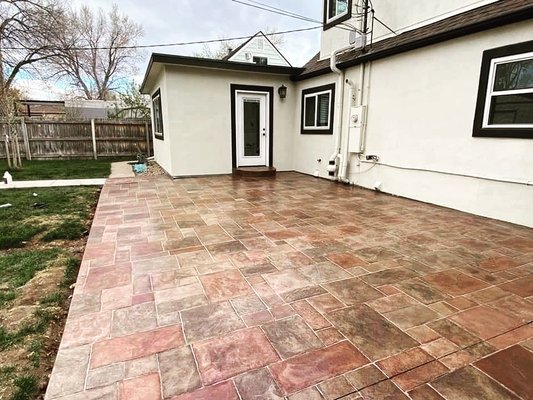 Stamped and stained concrete patio
Standard concrete patio - This was done using integral color concrete, stone stamping, and an antique stain applied afterwards to create a look in the concrete that mimics flagstone giving it more of a rustic look. Stamped and stained concrete patio
Standard concrete patio - This was done using integral color concrete, stone stamping, and an antique stain applied afterwards to create a look in the concrete that mimics flagstone giving it more of a rustic look.