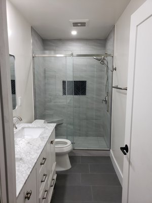 Encino Guest Bathroom - 2025 - Encino Guest Bathroom Was Completed by Popular Bathroom Professionals in February 2025, with a New Shower Basin step. New Shower Wall Tiles up to the Ceiling. New Shower Head, Hand Shower, and Faucet. New Long and Decorated Soap and Shampoo Niche. New Small leg lifting in the Corner. New Shower Floor Tiles with New Drain. Strong, Safe, and Secure Shower Glass Doors with Handles. The Ceiling was Painted with New Lights. The New Double Sink Vanity with Sinks and Faucets, a Countertop, and a Backsplash. New Long Mirror. New Electrical Switch and Electrical Outlets. Towel Ring. The same Toilet has been reinstalled on their New Bathroom Floor Tiles.
Please see more pictures on Yelp.com and call Popular Bathroom at (818) 267-8568 for your Free Consultation and Estimate from the Owner, Abraham Samara. Encino Guest Bathroom - 2025 - Encino Guest Bathroom Was Completed by Popular Bathroom Professionals in February 2025, with a New Shower Basin step. New Shower Wall Tiles up to the Ceiling. New Shower Head, Hand Shower, and Faucet. New Long and Decorated Soap and Shampoo Niche. New Small leg lifting in the Corner. New Shower Floor Tiles with New Drain. Strong, Safe, and Secure Shower Glass Doors with Handles. The Ceiling was Painted with New Lights. The New Double Sink Vanity with Sinks and Faucets, a Countertop, and a Backsplash. New Long Mirror. New Electrical Switch and Electrical Outlets. Towel Ring. The same Toilet has been reinstalled on their New Bathroom Floor Tiles.
Please see more pictures on Yelp.com and call Popular Bathroom at (818) 267-8568 for your Free Consultation and Estimate from the Owner, Abraham Samara.