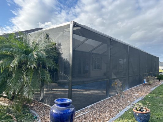 Bronze Mansard Pool Cage - This 34x18 mansard pool cage was done with high-quality material and built by our professional installers